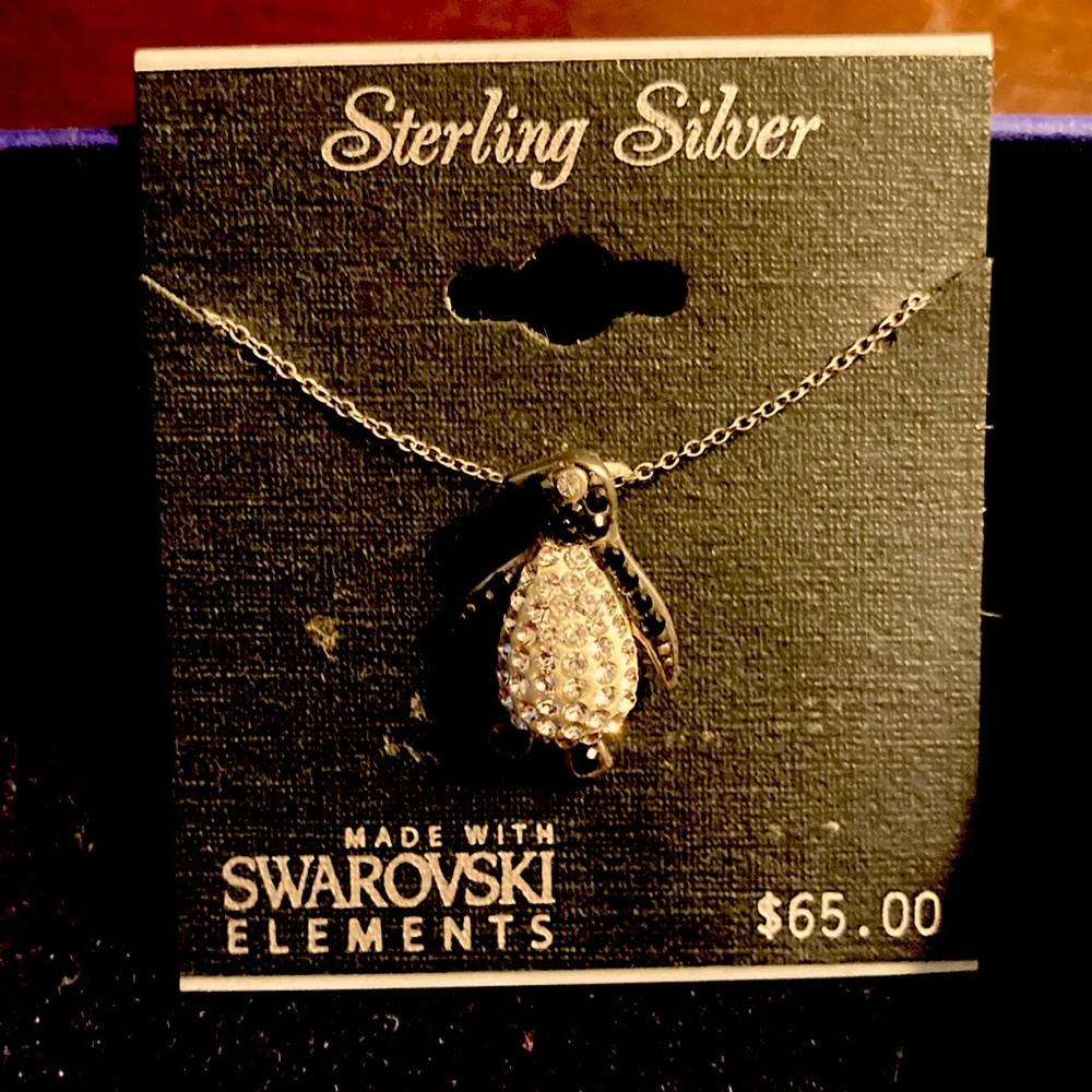 Brand new penguin Swarovski necklace still in original packaging